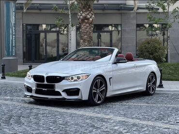 bmw 6 серия 635d: Ağ rəngdə, ikiqapılı sport kabriolet avtomobil. Avtomobilin üstü