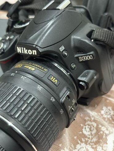 profil şekilleri: Tam işlək. Nikon D3100 model. Üzərinə AF-S Nikkor 18-55mm obyektivi
