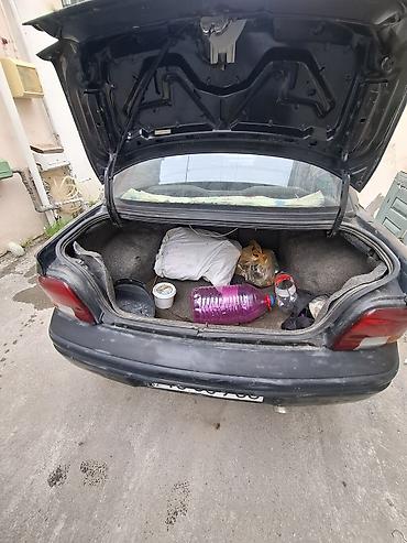 su motosikleti: Chrysler Neon: 2 l | 1997 il 203785 km Sedan — 7