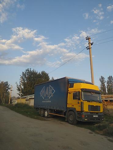 транс: Тентованный грузовик MAN с боковой и верхней загрузкой - — 1