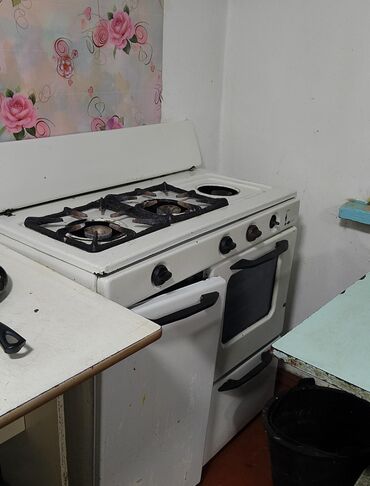 услуги кранов манипуляторов автовышек: Газовая плита с духовкой, классический дизайн - 4 газовые конфорки на