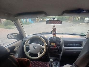 mazda mx: Mazda Demio: 2002 г., 1.3 л, Механика, Бензин, Хэтчбэк — 6