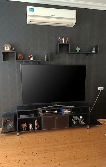 TV stend Ustde gorunen divar skaflari daxil satilir Yaxşı islenib