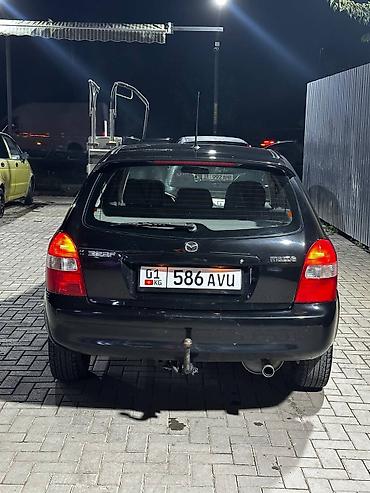 Mazda: Mazda 323: 2001 г., 1.6 л, Механика, Бензин, Седан — 12