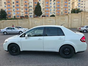Nissan: Nissan Tiida: 1.5 л | 2011 г. Седан — 3