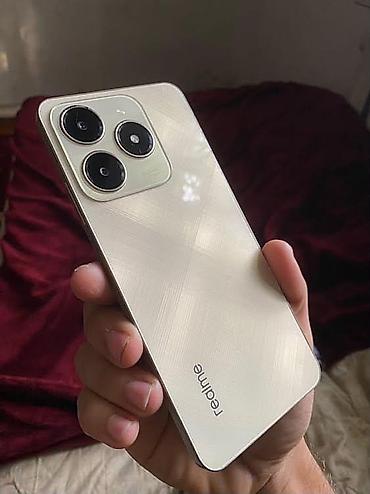 d19 pro v2: Смартфон realme (серия C/10 Pro‑стайл) в светлом цвете с плоскими — 1