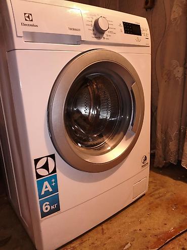 a 6: Electrolux TimeManager önyükləməli paltaryuyan maşın - Yük həcmi: 6 — 1