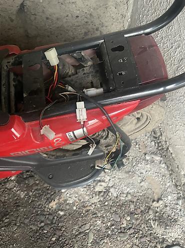 Скутеры: Электрический скутер (красный) с комплектом аксессуаров мини торг — 17