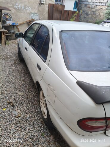 алабука авто: Nissan Almera: 1998 г., 1.6 л, Автомат, Бензин, Седан