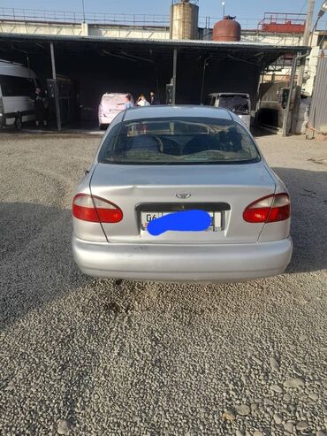 машине тико: Daewoo Lanos: 1997 г., 1.5 л, Механика, Бензин, Седан