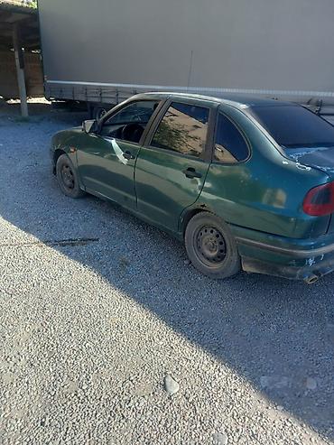 Транспорт: Volkswagen Polo: 1996 г., Бензин, Седан — 2