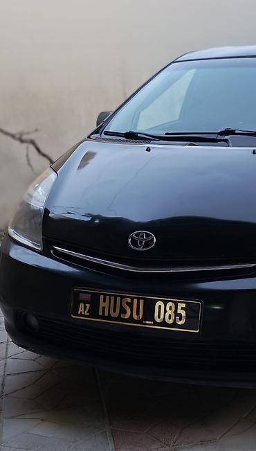 Avtomobil satışı: Toyota Prius (2-ci nəsil) – qara rəng, hatchback kuzov. - Hibrid — 2
