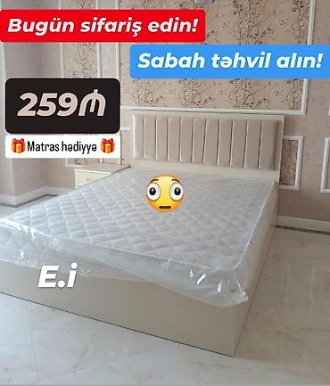stol stul satilir: - Yumşaq başlıqlı iki nəfərlik çarpayı: sadə və zərif dizayn, açıq — 1