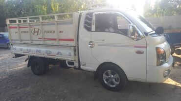 купить шины бу в бишкеке: Белый грузовик Hyundai Porter II с открытым кузовом предназначен для