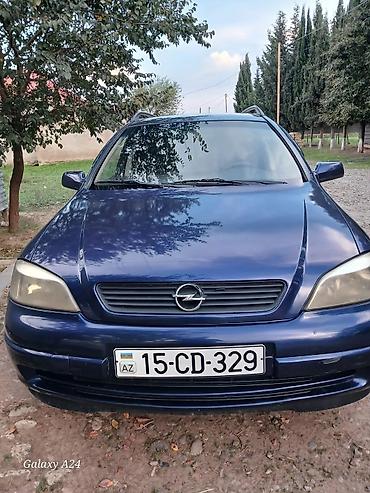 Продажа авто: Opel Astra Caravan (universal), mavi rəng. - Kuzov: universal, dam — 10