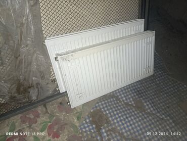 panel radyatör: Işlənmiş radiator iki ədəd hər ikisində dəlik var .yəqinki