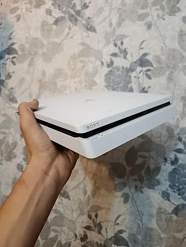 kablolar: PS4 Slim 500GB ağ rəngdə satılır. • Ən son sistem versiyası • Bütün — 1