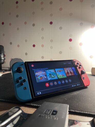 oyun planşeti: Nintendo switch oled Noqte cizigsiz demek olar istifade olunmayib