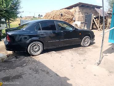 Продажа авто: Daewoo Nexia: 2000 г., Механика, Бензин, Седан — 5