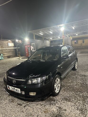 corolla runx: Mazda 323: 2002 г., 1.6 л, Механика, Газ, Хэтчбэк