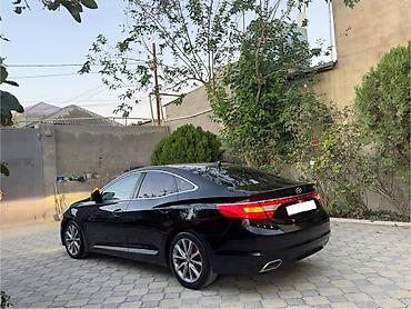 mitsubishi lancer evolution: Hyundai Grandeur: 2.2 l | 2015 il Sedan — 4