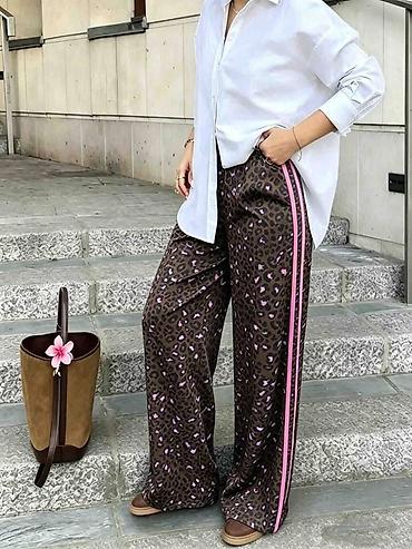 tigraste baletanke: 🔥Ženske široke pantalone sa animal printom i bočnim prugama
✅2400 din — 7