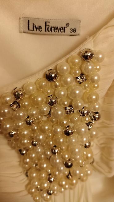 Ziyafət donları: Ağ don,2dəfə geyinilib.200azn alınıb — 11