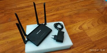 adsl модем: Təzə kimidir 25təcili satılır kamutator