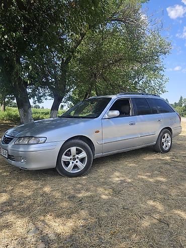 лад крузер: Mazda 626: 2001 г., 2 л, Механика, Бензин, Универсал — 3