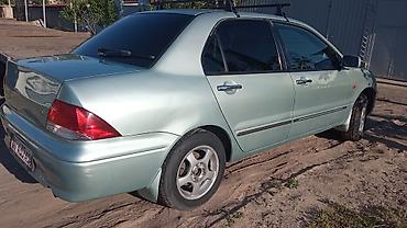 Mitsubishi: Mitsubishi Lancer: 2000 г., 1.5 л, Автомат, Бензин, Седан — 6