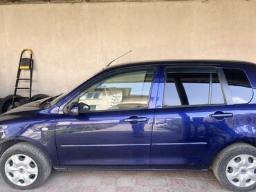 мини электромобиль: Mazda Demio: 2003 г., 1.3 л, Автомат, Бензин, Хетчбек