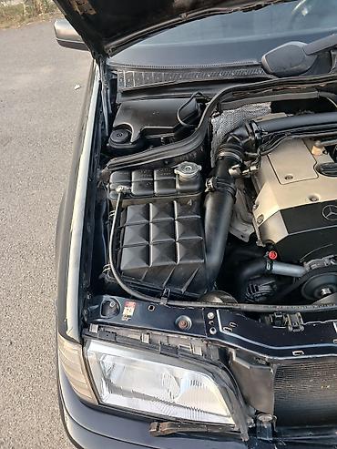 arxa şuşə: Mercedes-Benz C-Class универсал, 500 T modifikasiyası. Avtomobil qara — 7