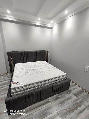 Yataq dəsti – yumşaq parça ilə üzlənmiş, qalın başlıq və ayaqlıq