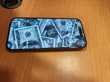 Apple iPhone: IPhone 15, 128 GB, Qara, Face ID — 7