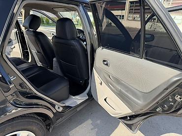 Транспорт: Mazda 323: 2002 г., 1.6 л, Механика, Бензин, Хэтчбэк — 10