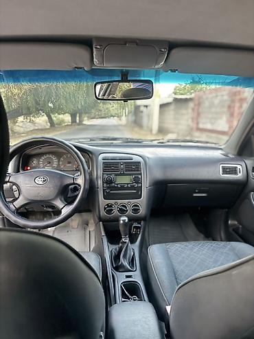 terrano 2: Toyota Avensis: 2002 г., 1.8 л, Механика, Бензин, Хэтчбэк — 6