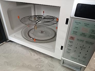 Mətbəx texnikası: SANYO Cook ‘n’ Grill mikrodalğalı soba Xüsusiyyətlər: - 1 100 W güc — 2