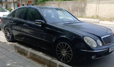 bmw 3 серия 316d: Mercedes-Benz E 320: 3.2 l | 2003 il Sedan