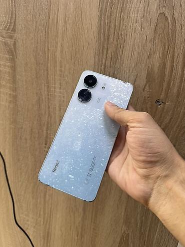 Мобильные телефоны и аксессуары: Redmi 13C, 128 ГБ, цвет - Голубой, Отпечаток пальца, Face ID — 1
