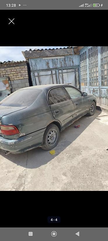 Унаа: Toyota Carina E: 1998 г., 0.2 - engine capacity л, Кол менен иштөөчү, Бензин, Седан — 1