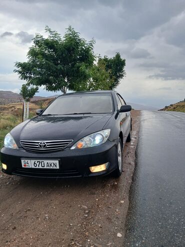 запчасти на мотоцикл иж планета: Автомобиль Toyota Camry черного цвета с классическим дизайном. Модель