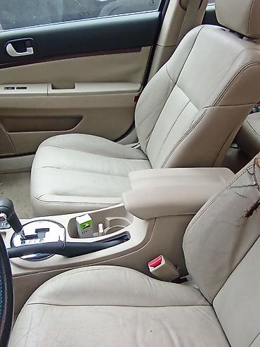 mitsubisi: Mitsubishi Galant sedan Xüsusiyyətlər: - Kuzov: ağ rəngli sedan, 4 — 5