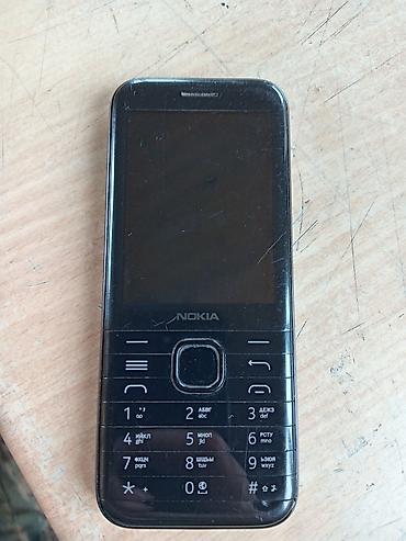 sempler kart: Nokia 800C, 4 GB, rəng - Qara, Düyməli, İki sim kartlı — 4