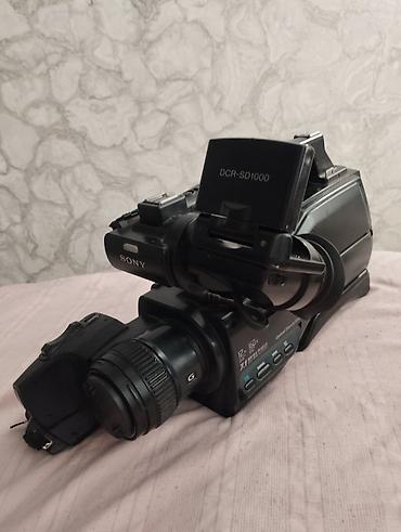 Видеокамеры: Видеокамера Sony DCR-SD1000 - Плечевая видеокамера с матрицей Exmor R — 7
