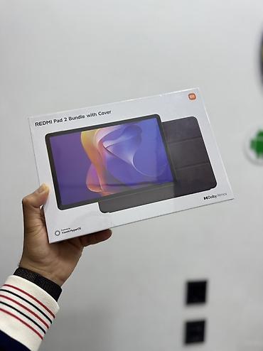 planset satiram: Məhsul: Xiaomi Redmi Pad 2 – Bundle with Cover Təsvir: - Planşet və — 1