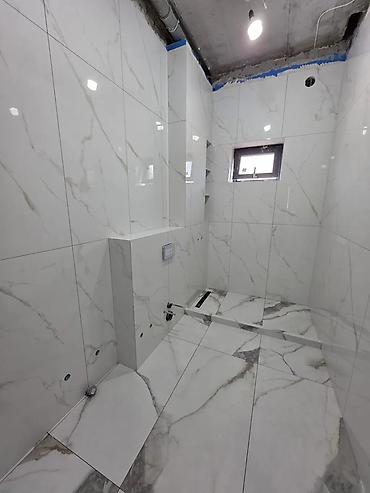 Укладка плитки: Профессиональная укладка крупноформатного керамогранита и плитки под — 1