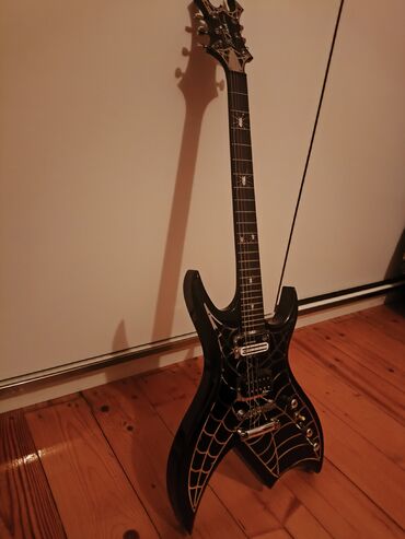 Elektro gitaralar: Elektron gitara, 6 sim, İşlənmiş, Ünvandan götürmə