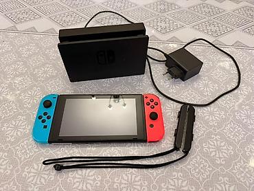 Nintendo Switch OLED: Nintendo Switch (не OLED), неоново‑красный/синий Торг или обмен — 1