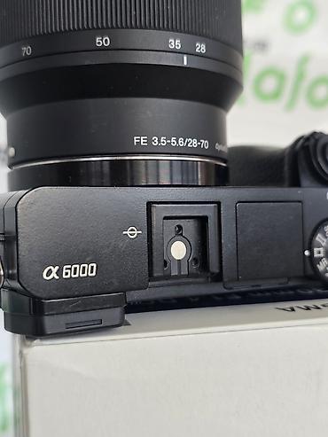 mini dv kamera: Sony Alpha a6000 aynasız fotoaparat + FE 28–70mm f/3.5–5.6 OSS — 6