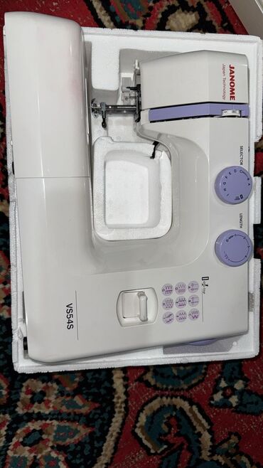 настольный микрофон: Тигүүчү машина Janome, Жарым автоматтык